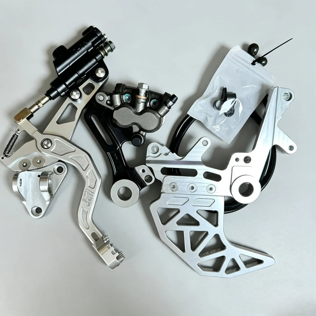 Dual Caliper Brake Bracket — Talaria X3/MX4, Surron LBX/Light Bee