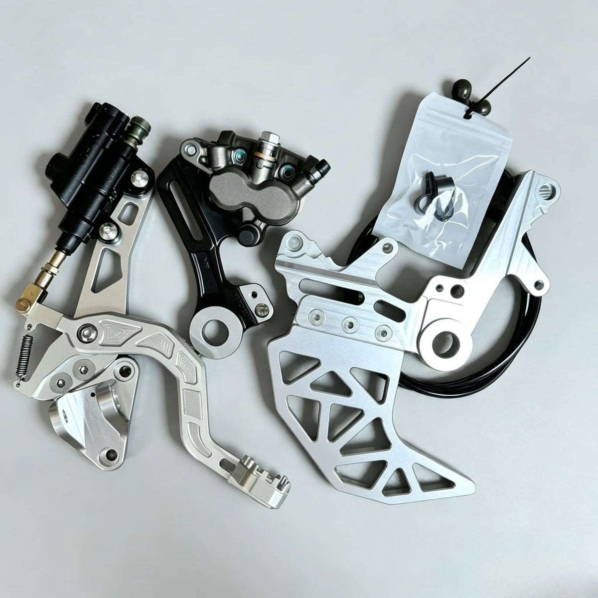 Dual Caliper Brake Bracket — Talaria X3/MX4, Surron LBX/Light Bee