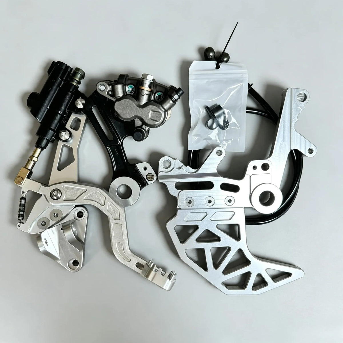 Dual Caliper Brake Bracket — Talaria X3/MX4, Surron LBX/Light Bee